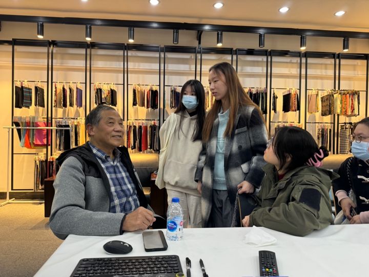 December 2023: talking with students after a lecture at Shanghai University of Engineering Science